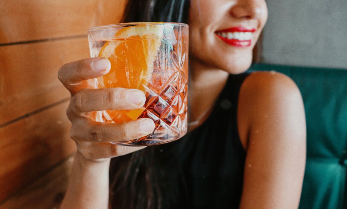 person holding a drink