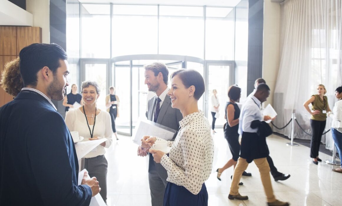 people talking at an expo event